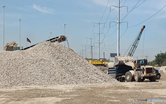Pile of crushed concrete aggregate at a recycling yard